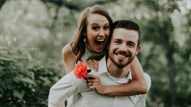 Happy couple embracing, representing the psychology of first love and memories.