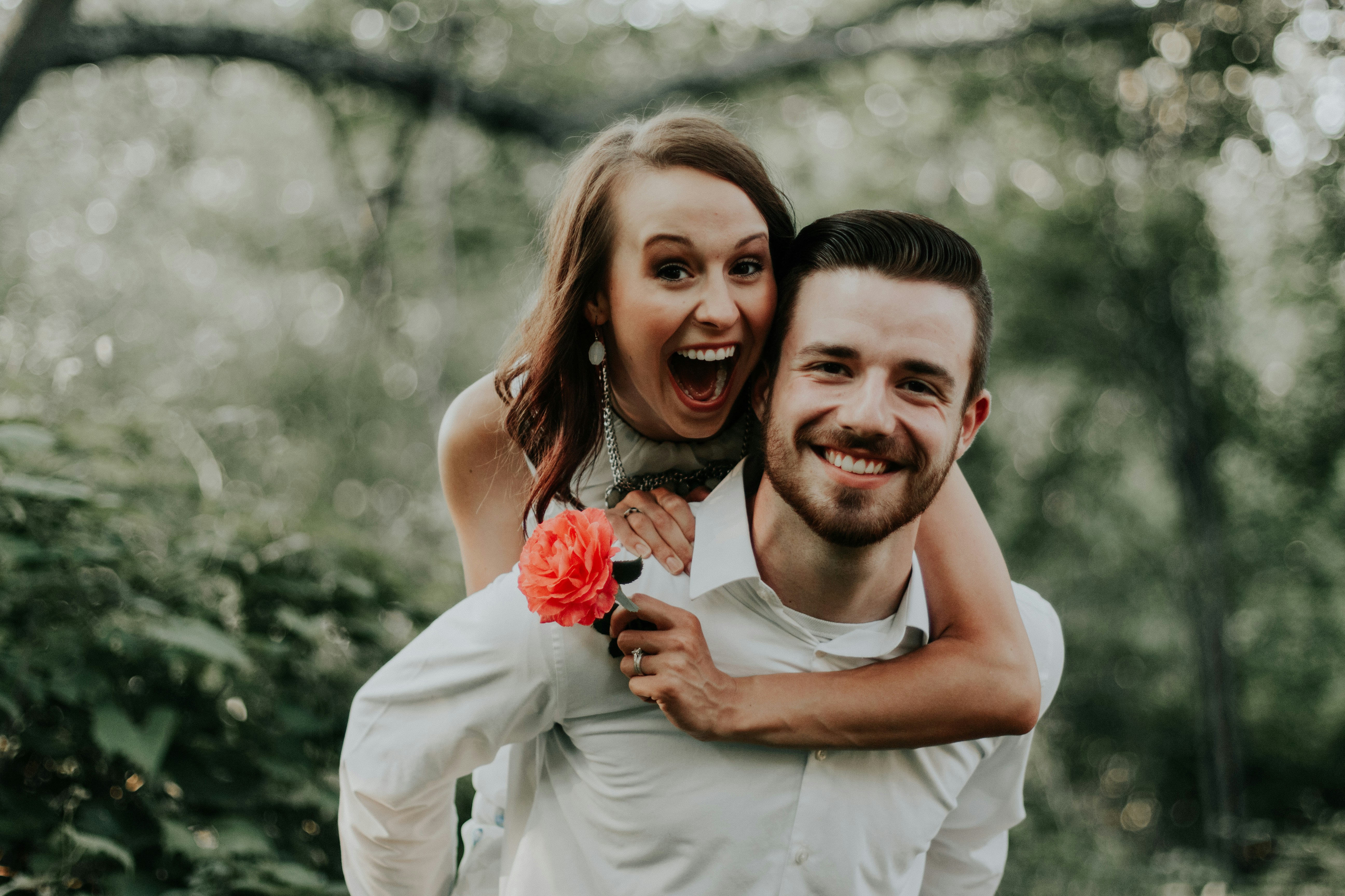 Happy couple embracing, representing the psychology of first love and memories.